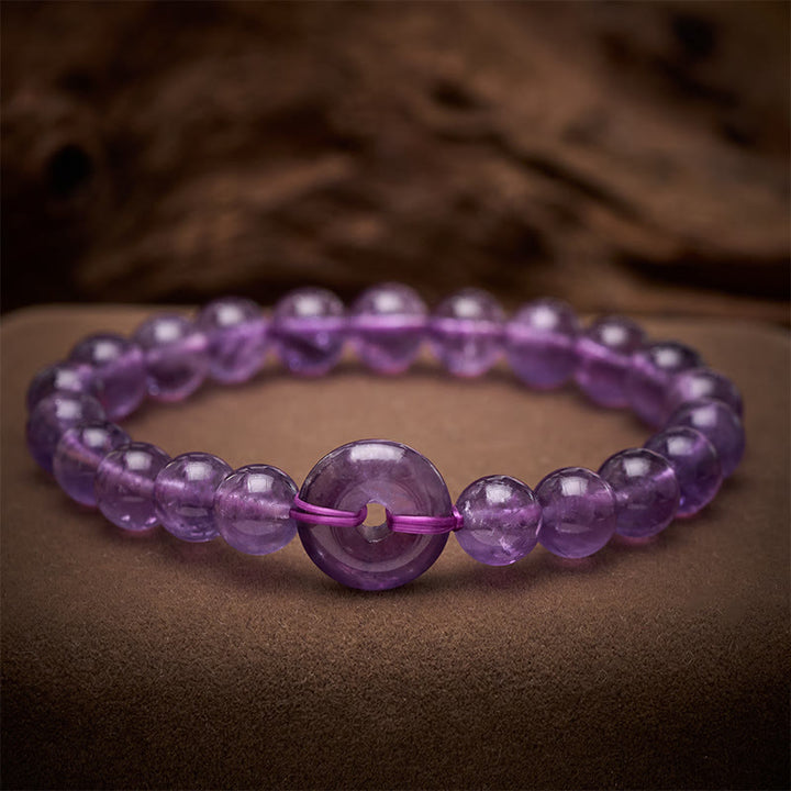 Buddha Stones Bracciale rotondo antistress con fibbia Peace in ametista, lucidato a mano. - Ametista (Circonferenza del polso: 5,9–6,3 pollici / 15–16 cm) - image 0