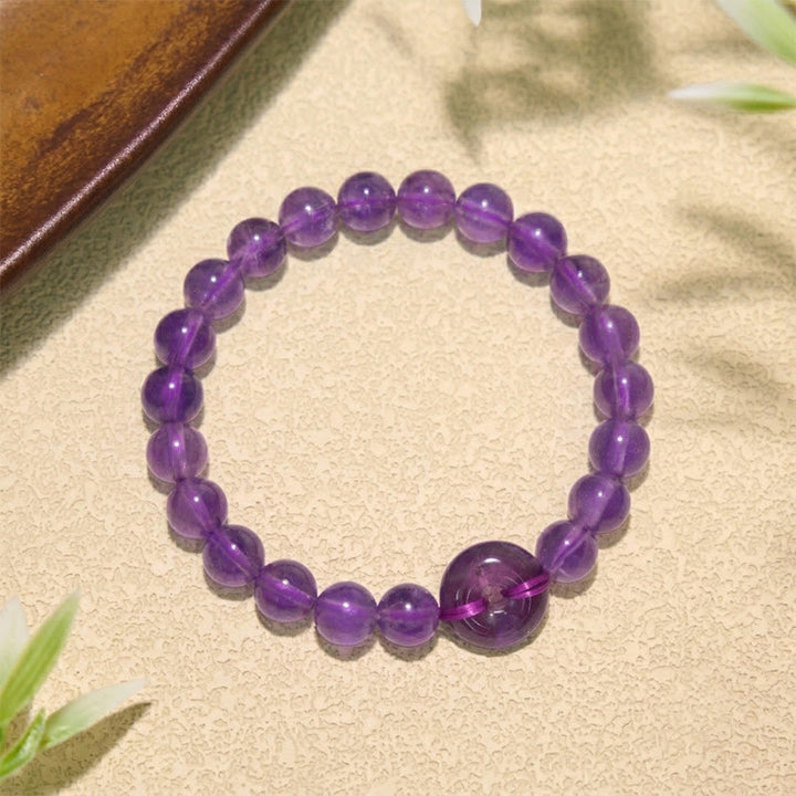 Buddha Stones Bracciale rotondo antistress con fibbia Peace in ametista, lucidato a mano. - image 1