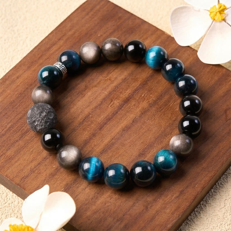Buddha Stones Bracciale di coppia con occhi di tigre blu e ossidiana con riflessi argentati, portafortuna - image 1