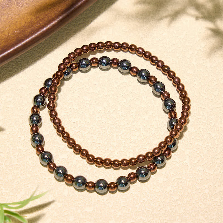 Buddha Stones Set di 2 braccialetti minimalisti rotondi in ematite per la messa a terra. - image 2