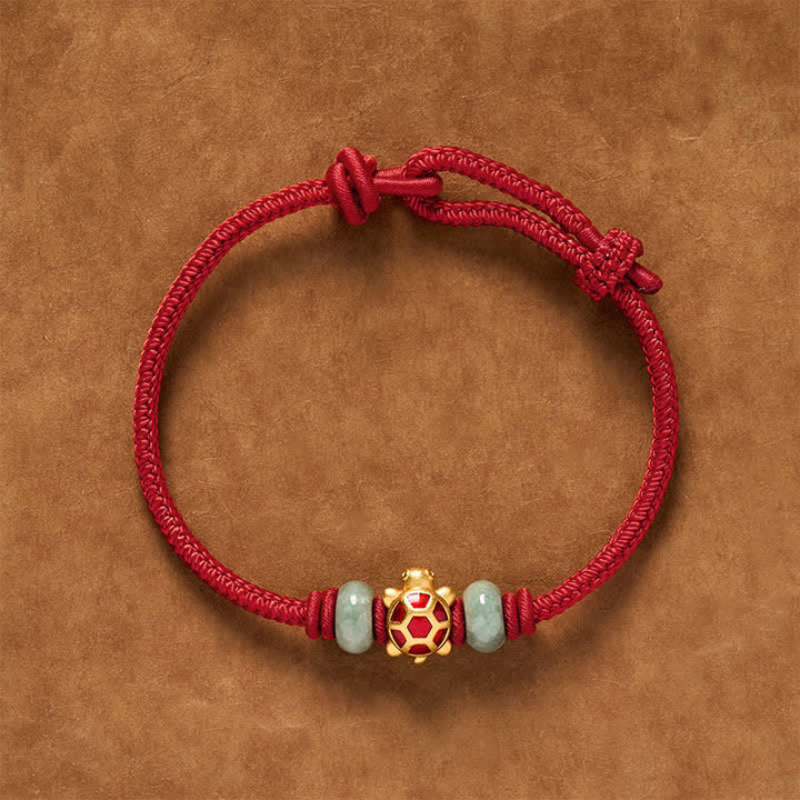 Buddha Stones Braccialetto portafortuna intrecciato a mano con filo rosso e tartaruga in rame. - image 0