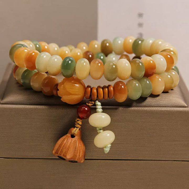 Buddha Stones Bracciale a doppio giro con loto bianco Bodhi Seed Bodhi Purificazione - Doppio giro (circonferenza del polso: 5,5–5,9 pollici (14–15 cm)) - image 0