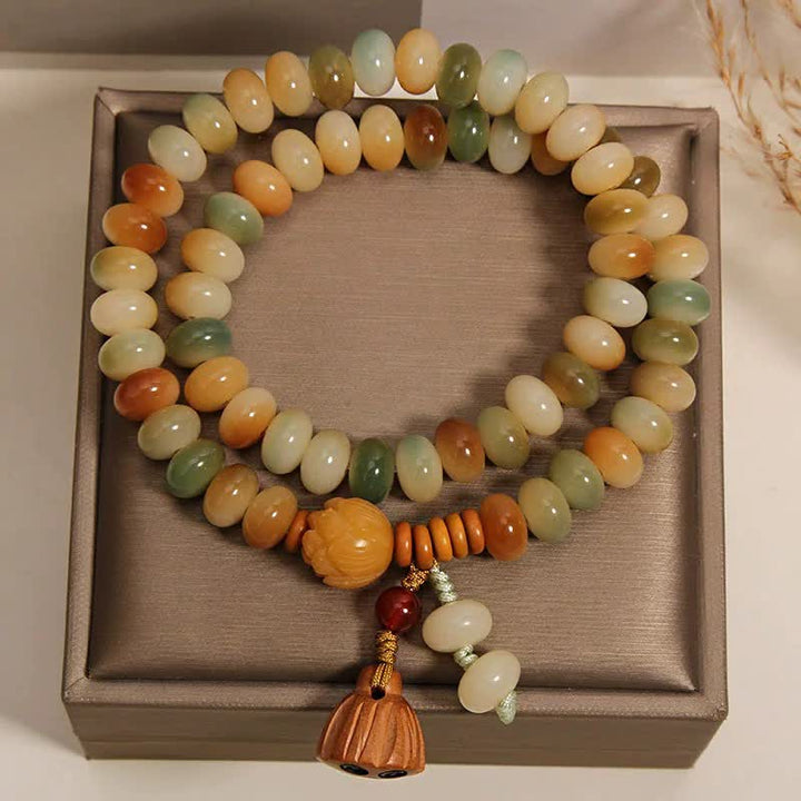 Buddha Stones Bracciale a doppio giro con loto bianco Bodhi Seed Bodhi Purificazione - image 1