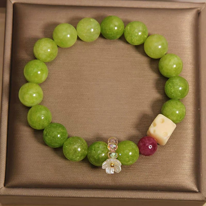 Buddha Stones Braccialetto curativo con ciondolo a forma di fiore di peridoto e perline - image 2