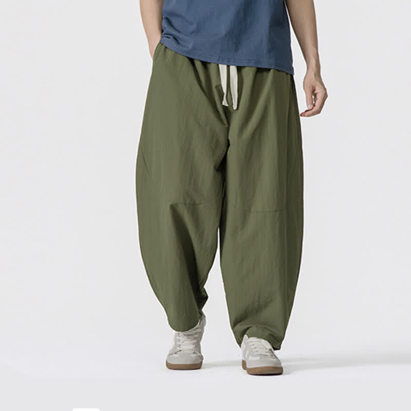 Buddha Stones Pantaloni corti da uomo casual, minimalisti, con coulisse, tinta unita, per primavera/estate, modello harem con tasche. - Verde oliva - US/UK/AU46, EU56 (5XL) - image 0