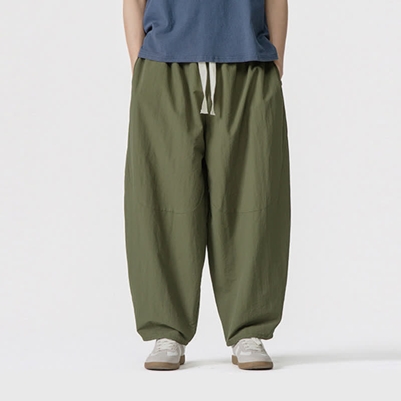 Buddha Stones Pantaloni corti da uomo casual, minimalisti, con coulisse, tinta unita, per primavera/estate, modello harem con tasche. - image 1