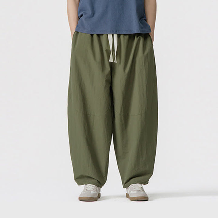 Buddha Stones Pantaloni corti da uomo casual, minimalisti, con coulisse, tinta unita, per primavera/estate, modello harem con tasche. - image 1