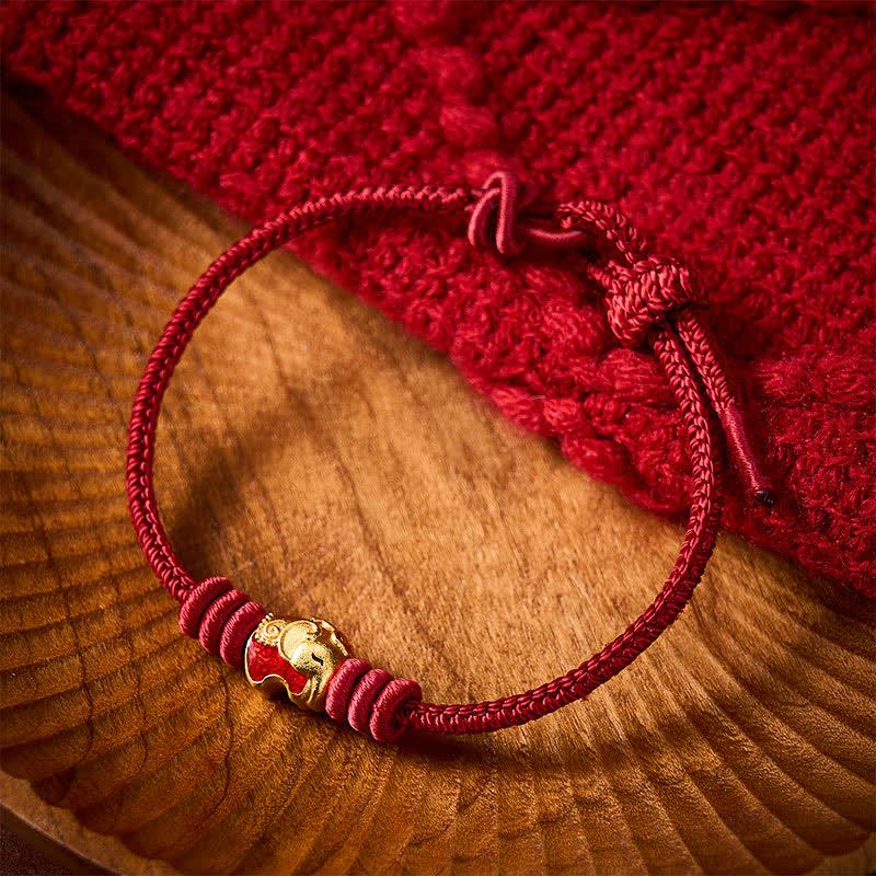 Buddha Stones Braccialetto di protezione portafortuna con cordino rosso e elefante rosso - image 1