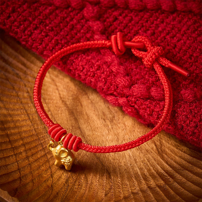 Buddha Stones Braccialetto con corda intrecciata rossa a forma di elefante Fu, simbolo di forza. - image 1