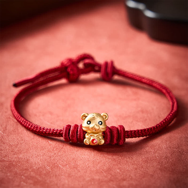 Buddha Stones Braccialetto con cordino intrecciato rosso e sacchetto portafortuna a forma di tigre - image 11
