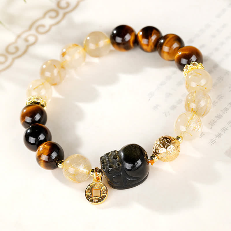 Buddha Stones Braccialetto portafortuna con perline di quarzo rutilato dorato e occhio di tigre Pi Xiu del Feng Shui. - image 1