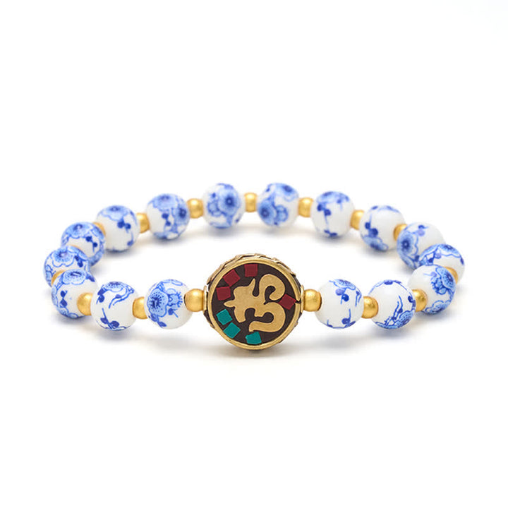 Buddha Stones Braccialetto con perline OM in rame, porcellana blu e bianca, simbolo di compassione. - image 9