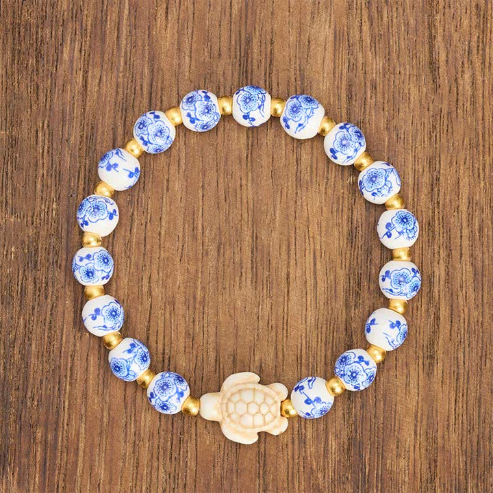Buddha Stones Braccialetto in porcellana blu e bianca a forma di tartaruga, simbolo di purezza e longevità - image 1