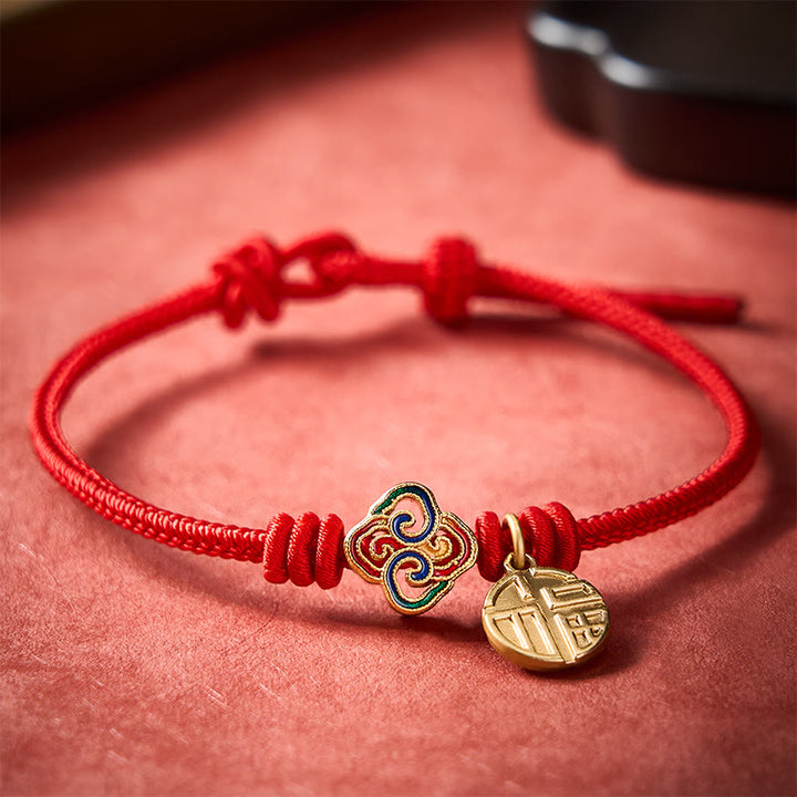 Buddha Stones Braccialetto portafortuna intrecciato a mano con cordino rosso e carattere Fu in rame, con motivo annodato cinese. - image 1
