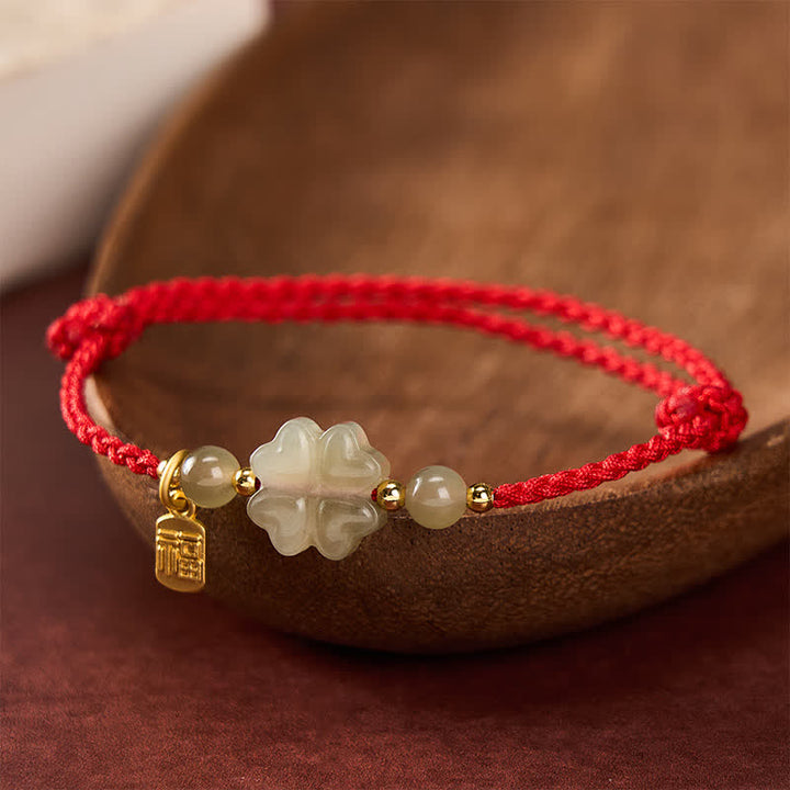 Braccialetto con cordino rosso e giada Hetian naturale Buddha Stones con quadrifoglio e simbolo Fu portafortuna. - image 3