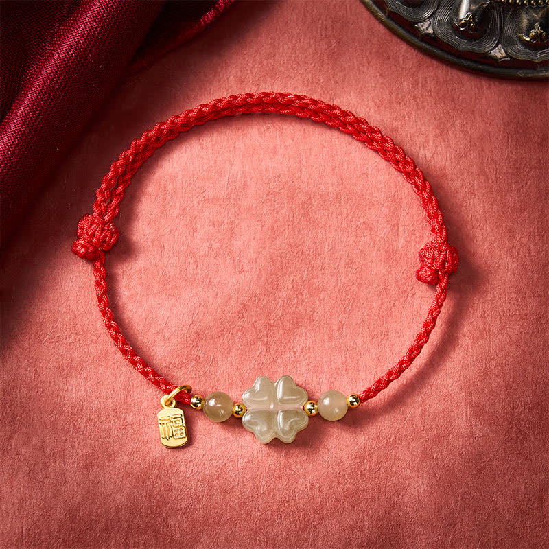 Braccialetto con cordino rosso e giada Hetian naturale Buddha Stones con quadrifoglio e simbolo Fu portafortuna. - image 1