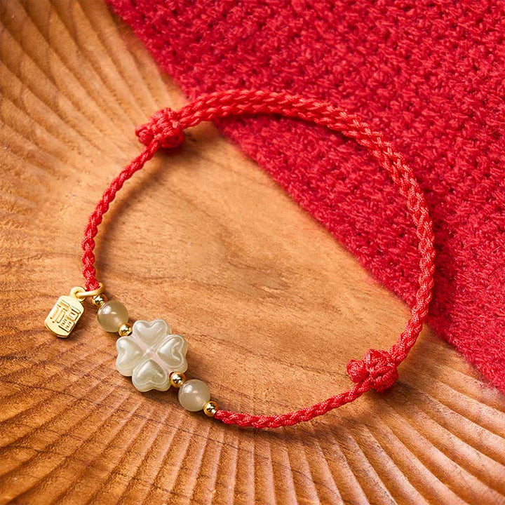 Braccialetto con cordino rosso e giada Hetian naturale Buddha Stones con quadrifoglio e simbolo Fu portafortuna. - image 2
