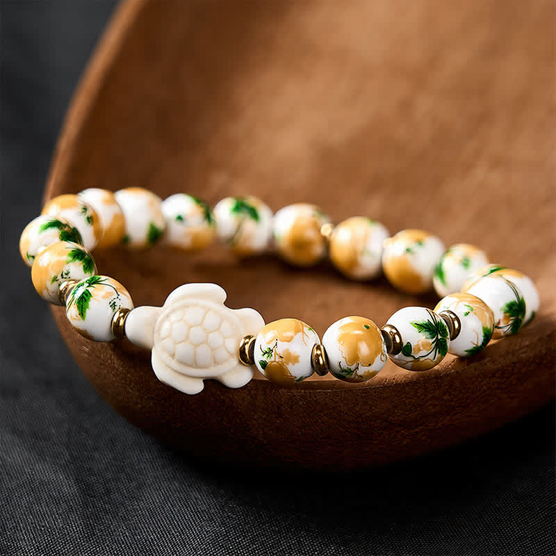 Buddha Stones Bracciale portafortuna con design a tartaruga e turchese bianco naturale - Porcellana bianca (circonferenza del polso: 6,3–6,7 pollici/16–17 cm) - image 0