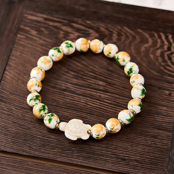 Buddha Stones Bracciale portafortuna con design a tartaruga e turchese bianco naturale - image 1