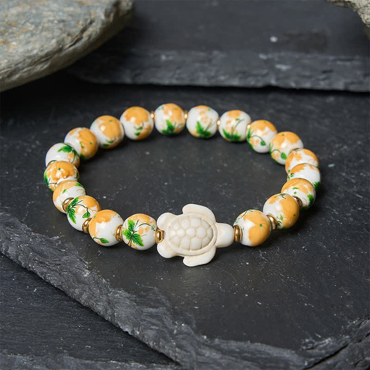 Buddha Stones Bracciale portafortuna con design a tartaruga e turchese bianco naturale - image 2