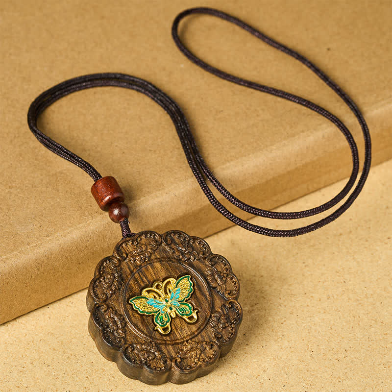 Buddha Stones Collana con ciondolo a farfalla in legno di sappanwood intagliato, trasformazione - image 1