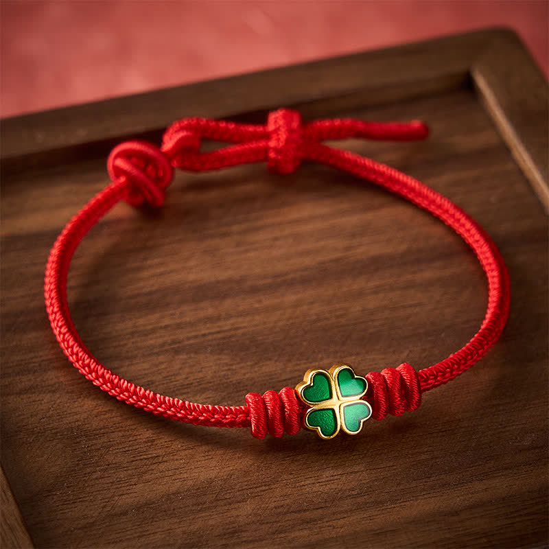 Buddha Stones Braccialetto portafortuna a forma di cuore con corda rossa intrecciata a mano e quadrifoglio verde. - image 1