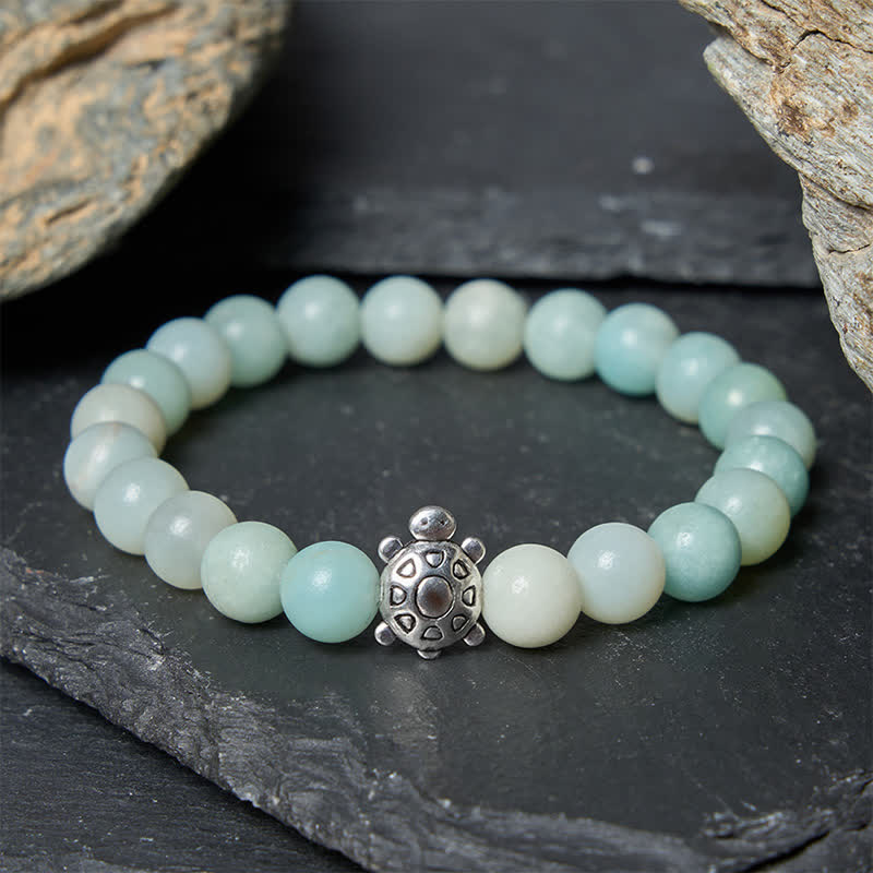 Buddha Stones Braccialetto con perle rotonde in rame e amazzonite a forma di tartaruga, lucidato a mano. - image 1
