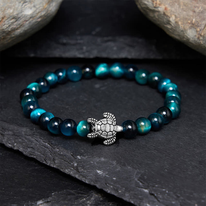 Buddha Stones Bracciale potente con tartaruga in rame e occhio di tigre blu - Occhio di tigre blu da 6 mm (circonferenza del polso: 5,5–5,9 pollici/14–15 cm) - image 0