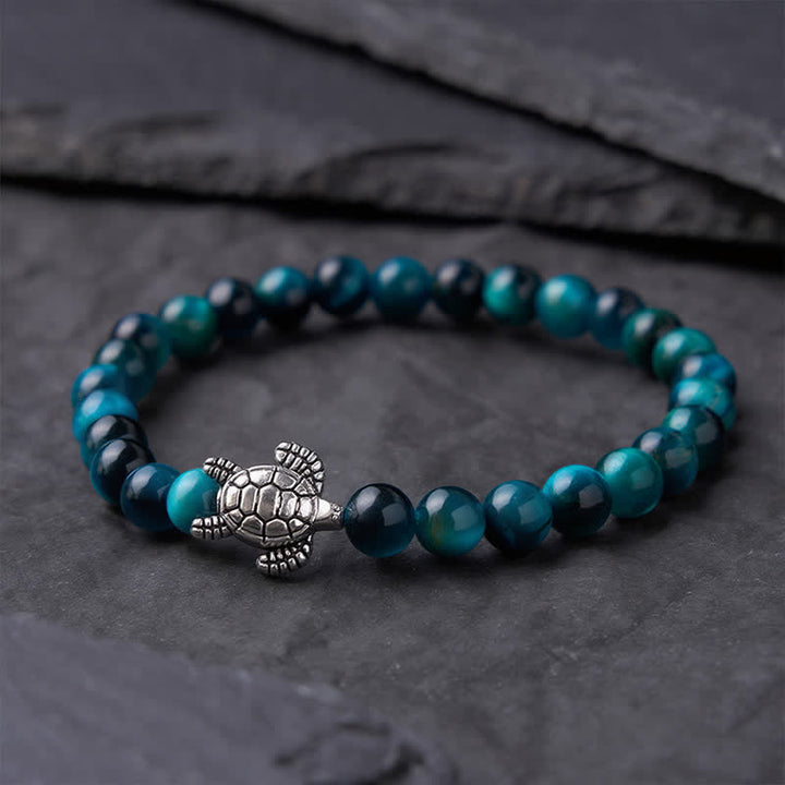Buddha Stones Bracciale potente con tartaruga in rame e occhio di tigre blu - image 1