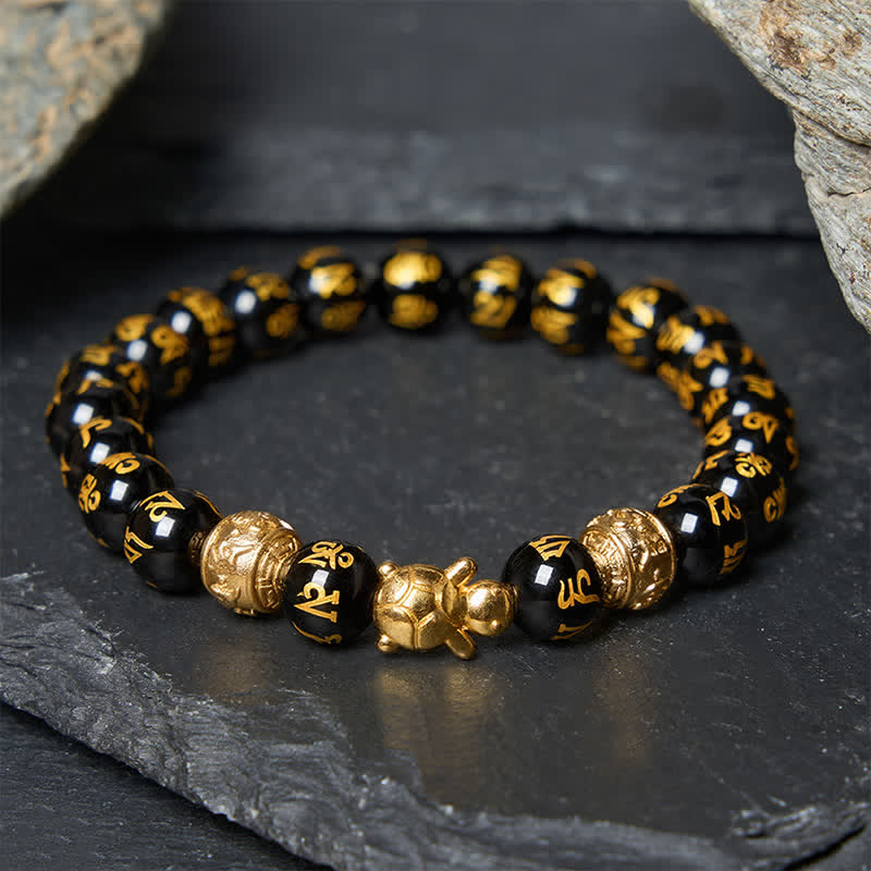 Buddha Stones Bracciale Om Mani Padme Hum Turtle Strength con perline di onice nera naturale. - Onice nero da 8 mm (circonferenza del polso: 15-16 cm) - image 0