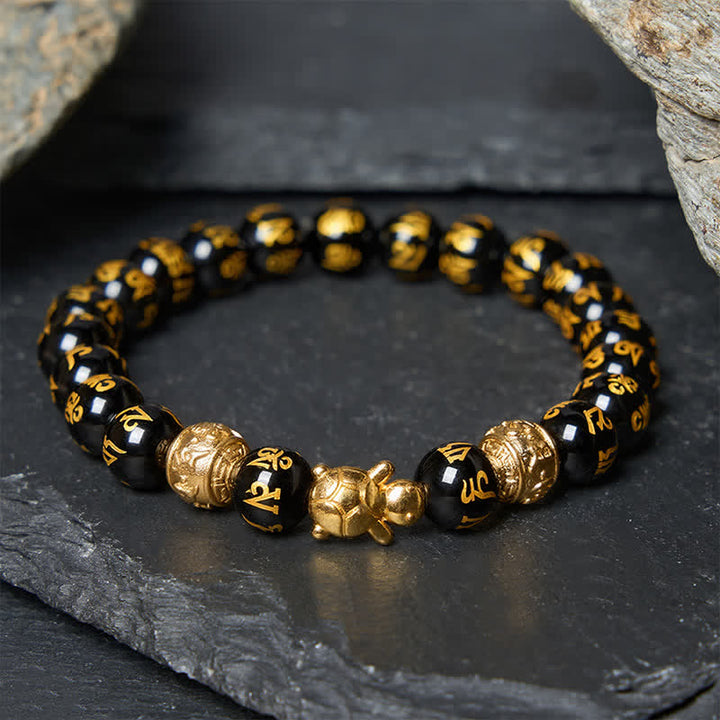 Buddha Stones Bracciale Om Mani Padme Hum Turtle Strength con perline di onice nera naturale. - Onice nero da 8 mm (circonferenza del polso: 15-16 cm) - image 0