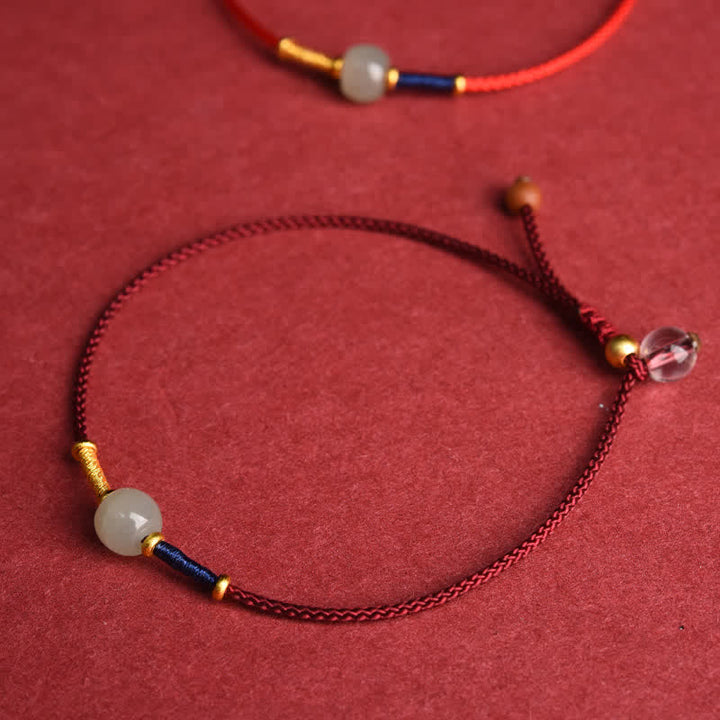 Buddha Stones Cavigliera regolabile con perline rotonde di giada e cordino rosso. - image 1
