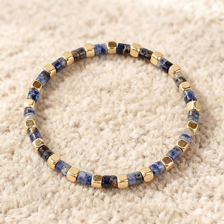 Buddha Stones Bracciale rinforzato con perle naturali a forma di barilotto in diaspro blu maculato e avventurina verde. - Diaspro a macchie blu (Comunicazione ♥ Chiarezza) - image 0
