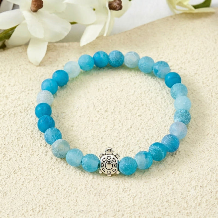 Buddha Stones Braccialetto con perline a forma di tartaruga in agata blu screpolata, ideale per calmare gli animali. - Agata blu screpolata (Circonferenza del polso: 15-16 cm) - image 0