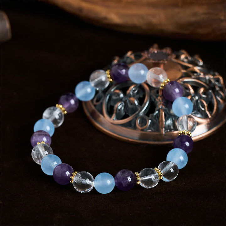 Buddha Stones Bracciale protettivo con perle di quarzo trasparente, ametista e calcedonio blu. - image 3