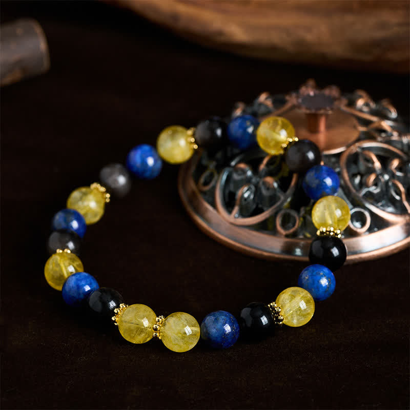 Buddha Stones Bracciale Serenity con perle di lapislazzuli, ossidiana e citrino con riflessi argentati. - image 1