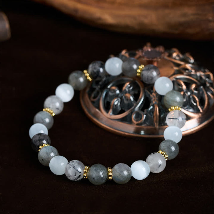 Buddha Stones Bracciale dell'abbondanza con perle di quarzo rutilato nero e pietra occhio di gatto bianca. - image 1