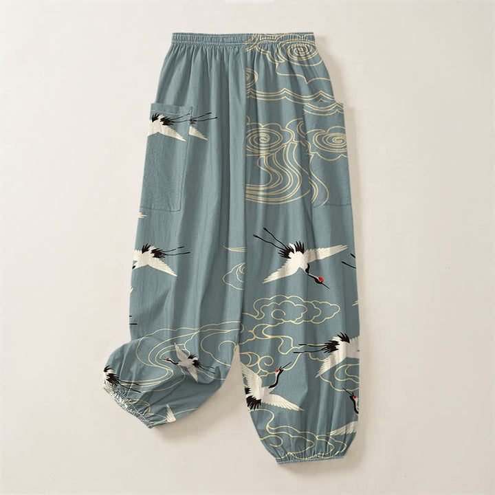 Buddha Stones Pantaloni harem da donna in cotone con elastico in vita e tasche laterali, fantasia orientale bianca con gru e nuvole. - image 4
