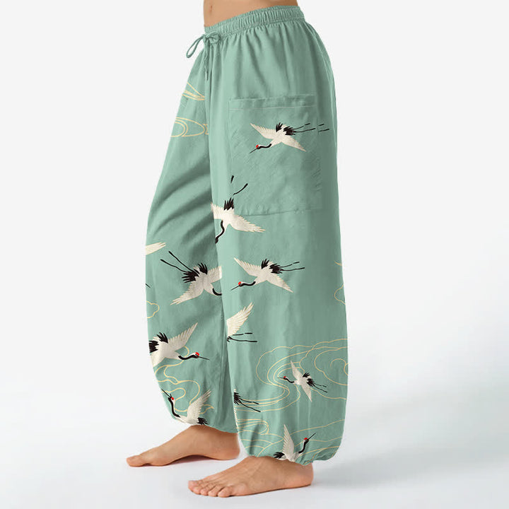 Buddha Stones Pantaloni harem da donna in cotone con elastico in vita e tasche laterali, fantasia orientale bianca con gru e nuvole. - image 11