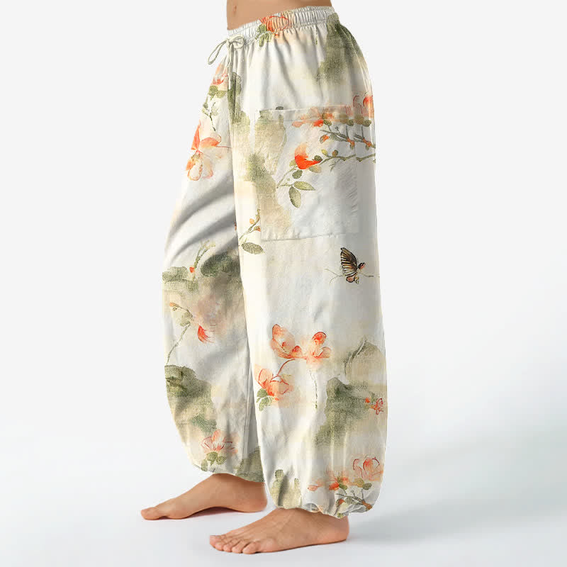 Buddha Stones Pantaloni harem da donna in cotone con elastico in vita e motivo floreale ad acquerello con farfalle, dotati di tasche laterali. - image 1