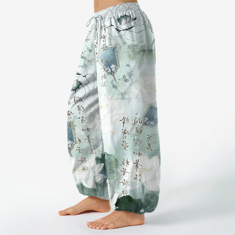 Buddha Stones Pantaloni harem da donna in cotone con stampa effetto loto e vita elasticizzata, con tasche laterali. - image 1