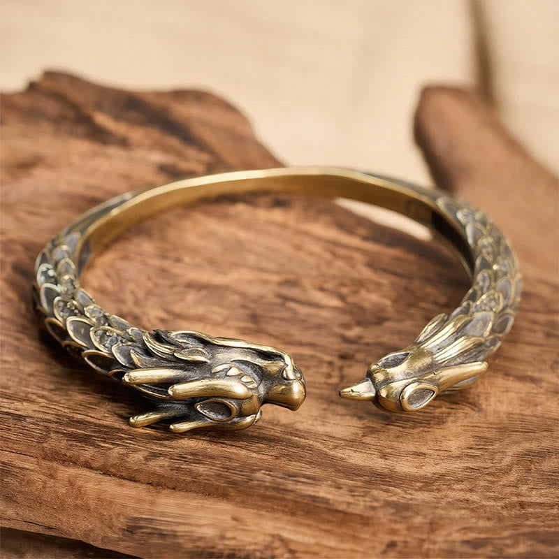 Buddha Stones Bracciale aperto in ottone anticato con drago e fenice, simbolo di forza. - image 1