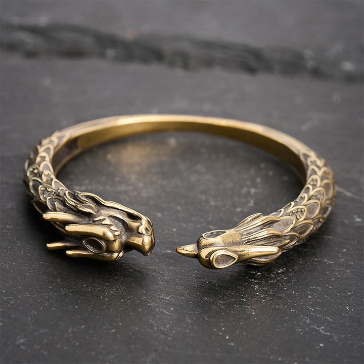 Buddha Stones Bracciale aperto in ottone anticato con drago e fenice, simbolo di forza. - image 2