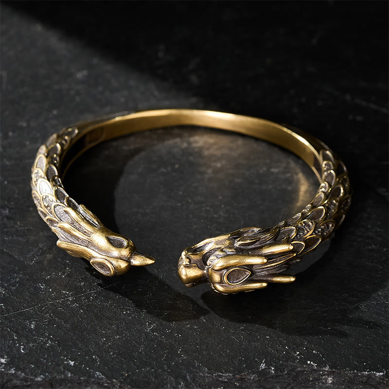 Buddha Stones Bracciale aperto in ottone anticato con drago e fenice, simbolo di forza. - image 3