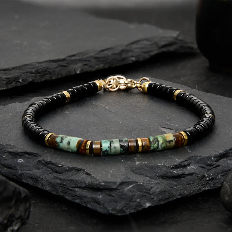 Buddha Stones Bracciale protettivo con perline rotonde in onice nera e turchese - image 1
