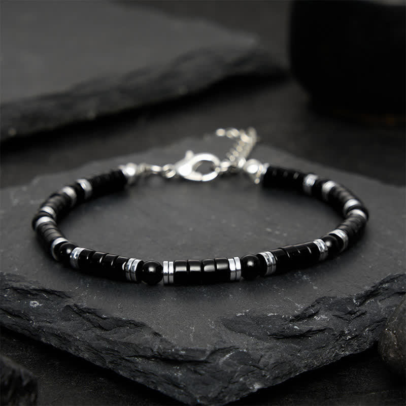 Buddha Stones Bracciale protettivo con distanziatori cilindrici satinati in onice nera - image 10