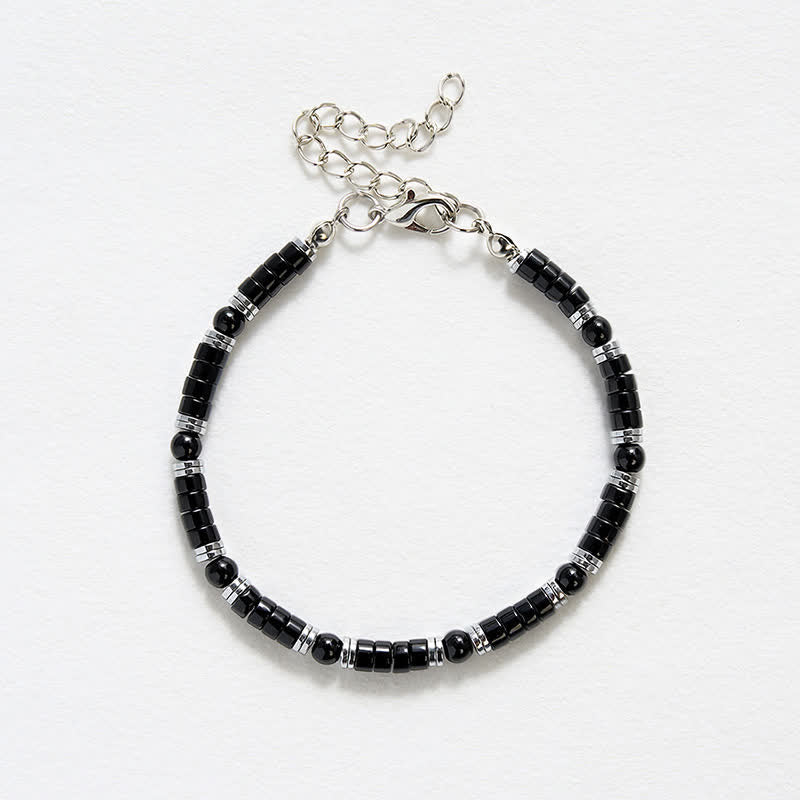 Buddha Stones Bracciale protettivo con distanziatori cilindrici satinati in onice nera - image 12