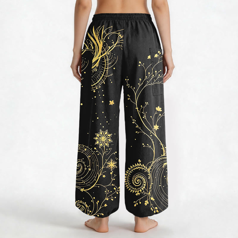 Buddha Stones Pantaloni harem da donna in cotone con elastico in vita e motivo floreale a spirale di drago dorato, con tasche laterali. - image 2