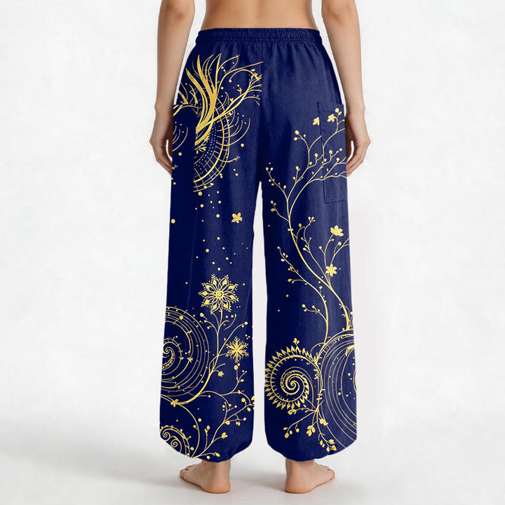 Buddha Stones Pantaloni harem da donna in cotone con elastico in vita e motivo floreale a spirale di drago dorato, con tasche laterali. - image 9