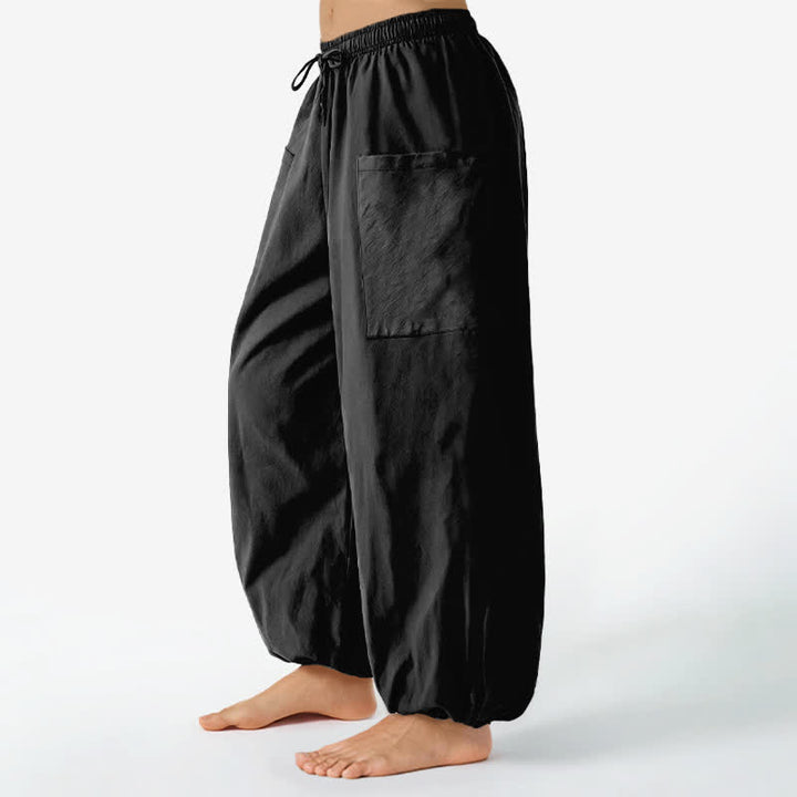 Buddha Stones Pantaloni harem da donna in cotone a tinta unita, con fantasia minimalista e vita elasticizzata, dotati di tasche laterali. - image 1